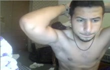 Sexy guy stripping in front of the webcam