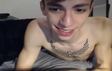 Skinny tattooed boy solo on webcam